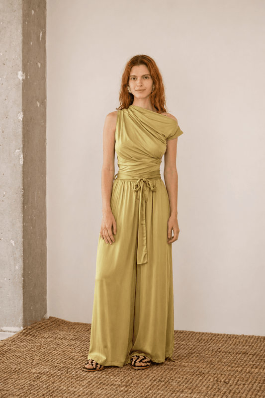 Wide Ecovero Trousers in Soft Olive showcased on a model, featuring a relaxed silhouette and detachable belt.