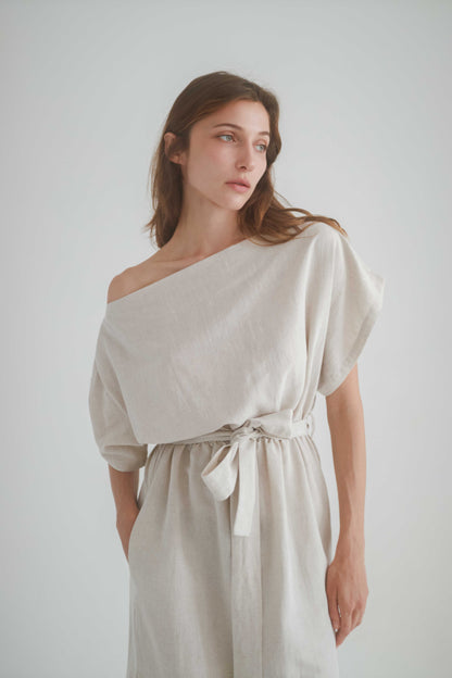 Natural drape dress with off-shoulder neckline, elasticated waist, and a separate belt, made from organic cotton and linen.