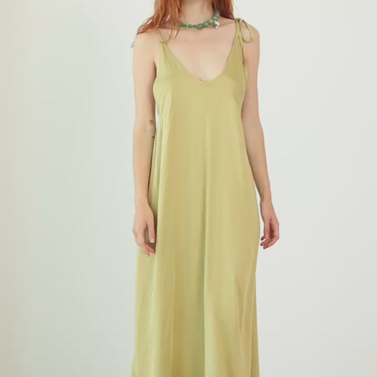 Ecovero Maxi Dress in Soft Olive worn by model, showcasing its fluid design and effortless style.
