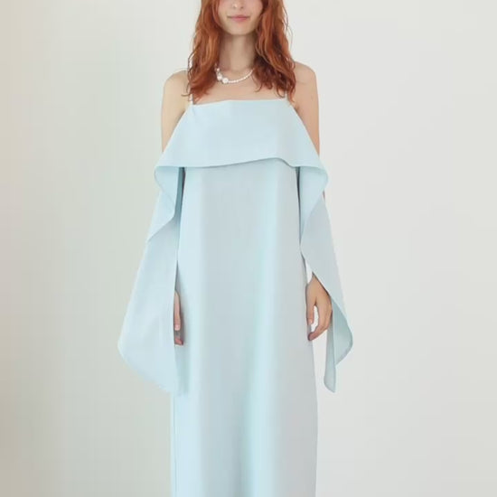 Organic Cotton Sun Dress with Front Frill in Pale Blue worn by a model, showcasing a relaxed daytime silhouette.